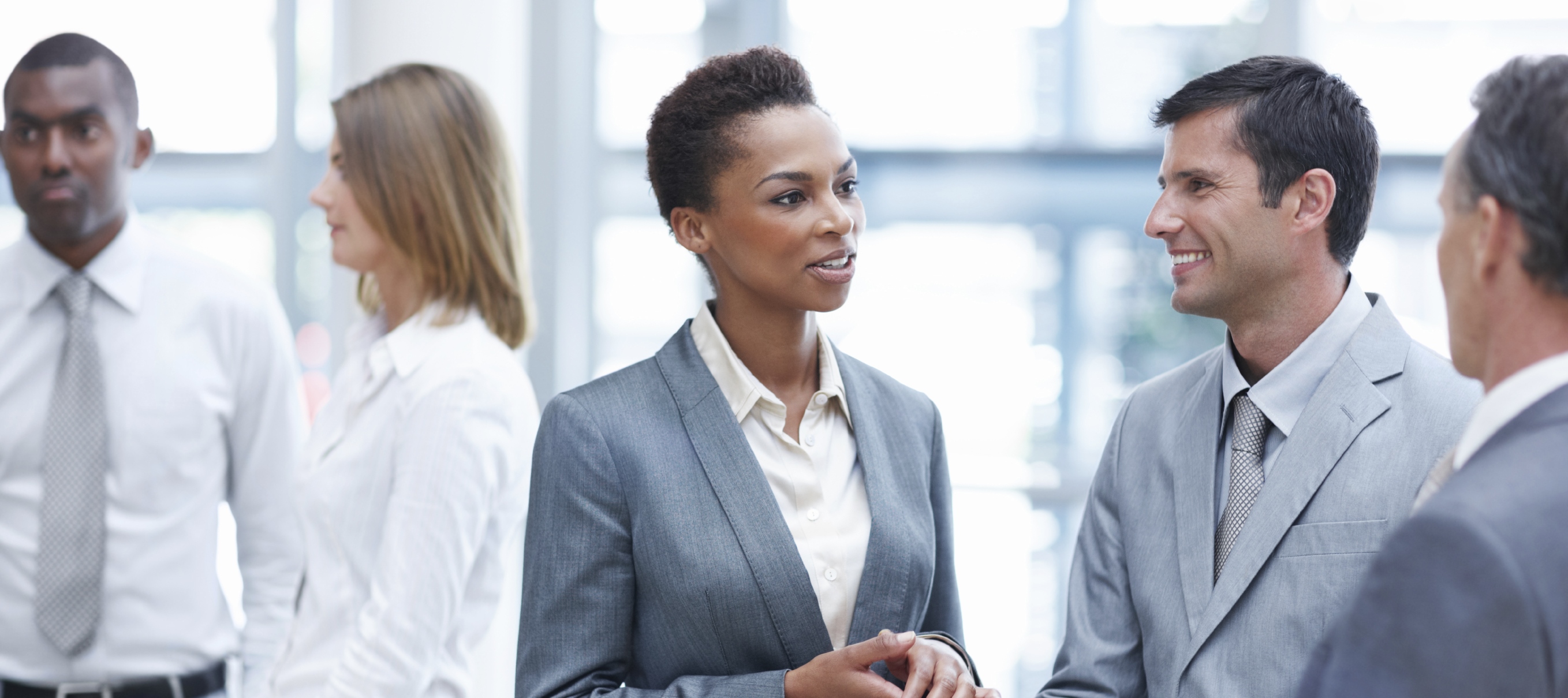 A group of office colleagues making some small talk out of the office »  O'Farrell Career Management